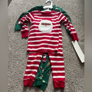 Carters new with tags Christmas pj’s 2 pack -18 months